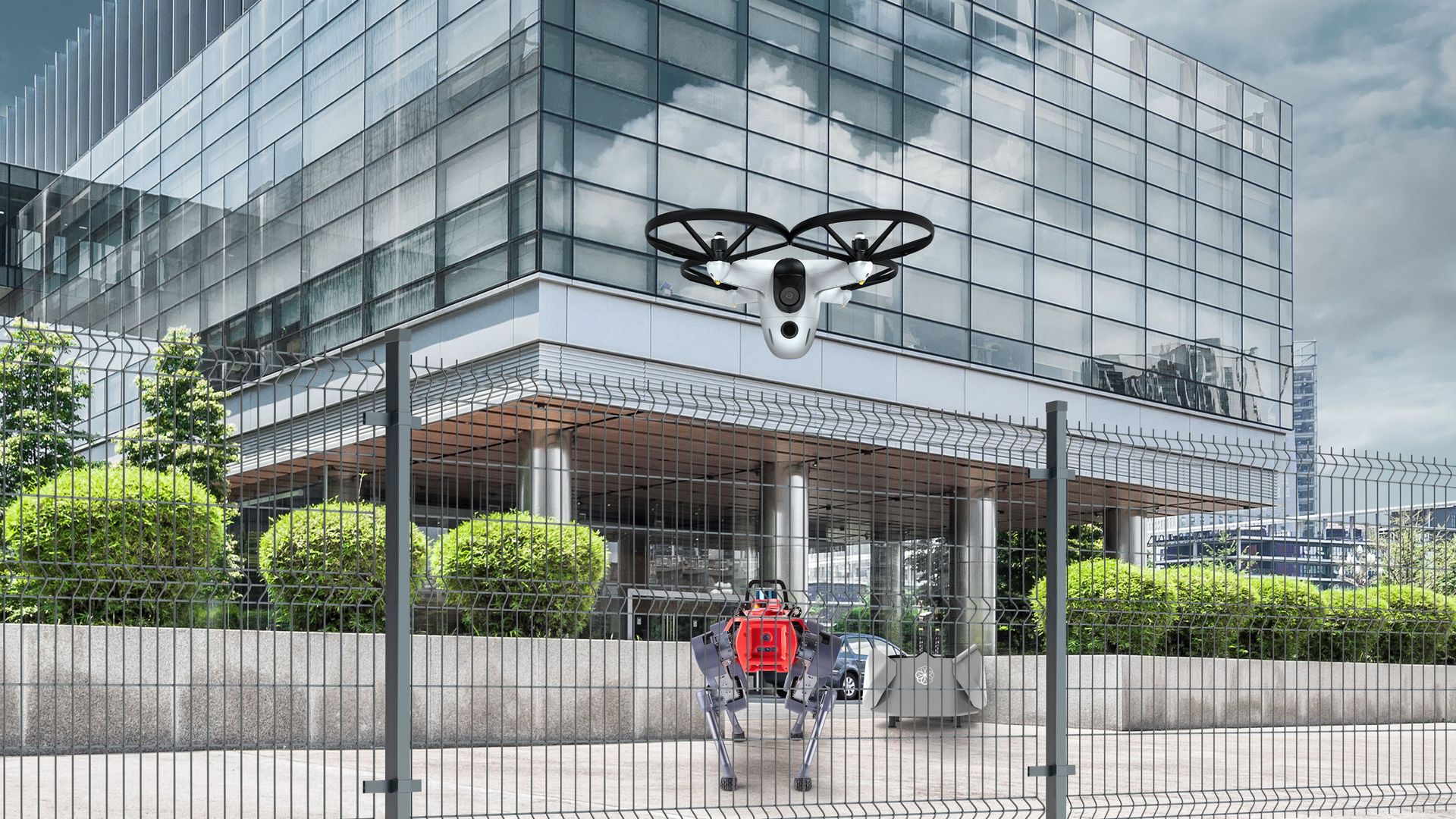 SecuriBotic Agent Bee & SecuriBotic Agent Anymal vor einem Gebäude